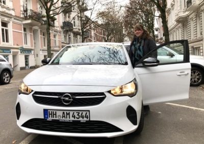 Ladies with white car